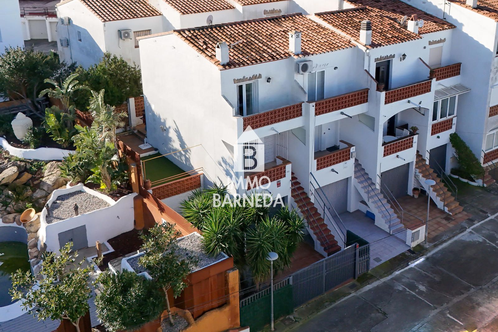Maison chaleureuse avec terrain à Puig Rom avec piscine communautaire et garage privé
