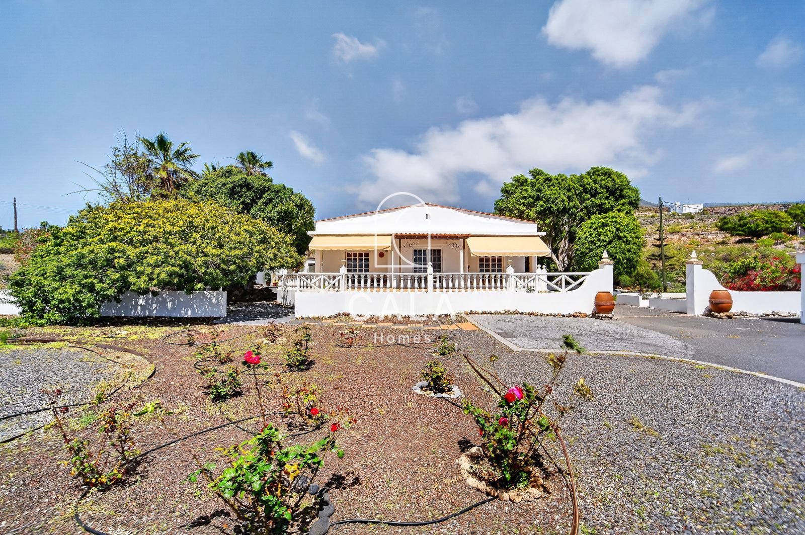 Country house with land and sea views.