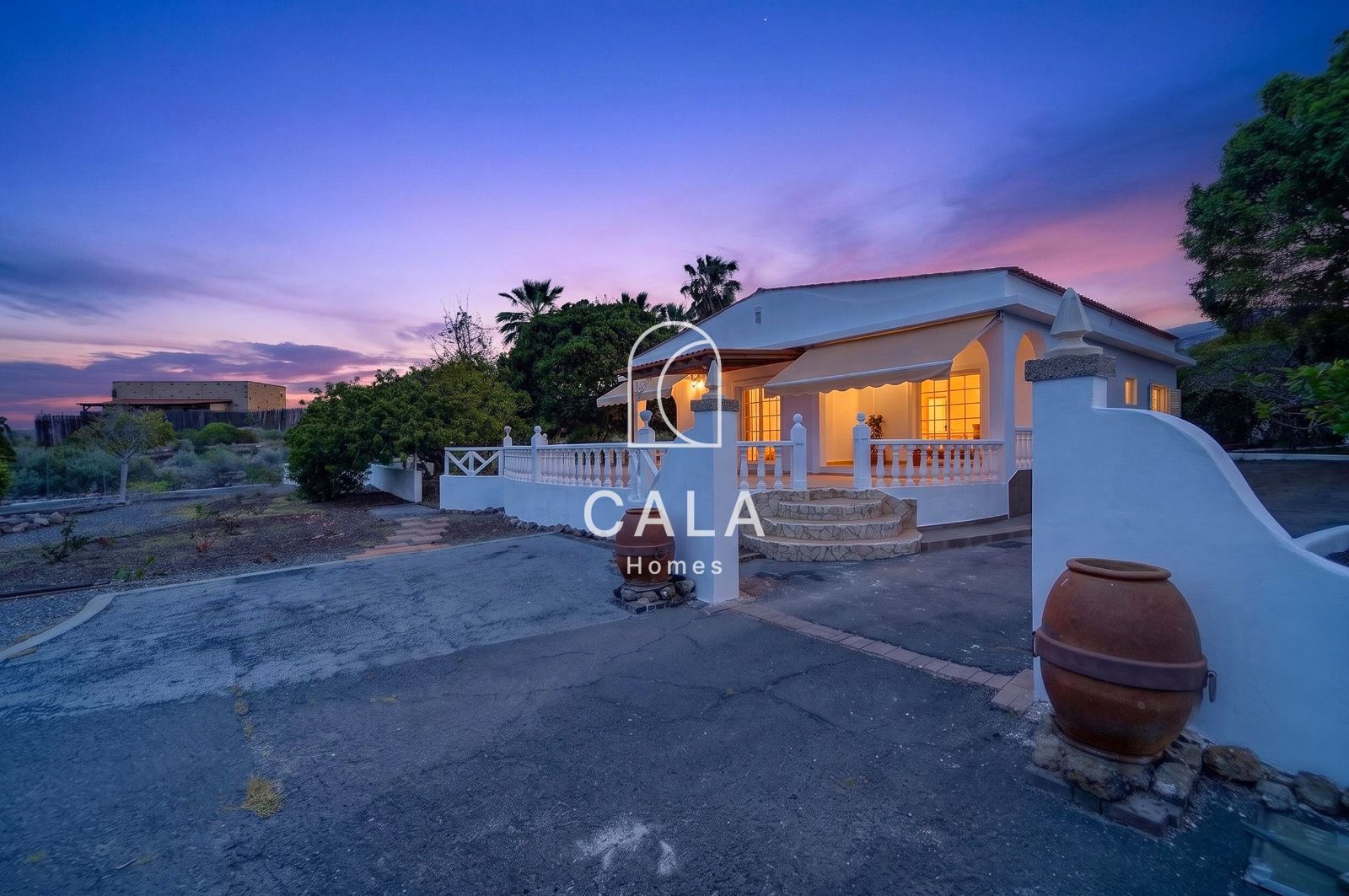 Country house with land and sea views.