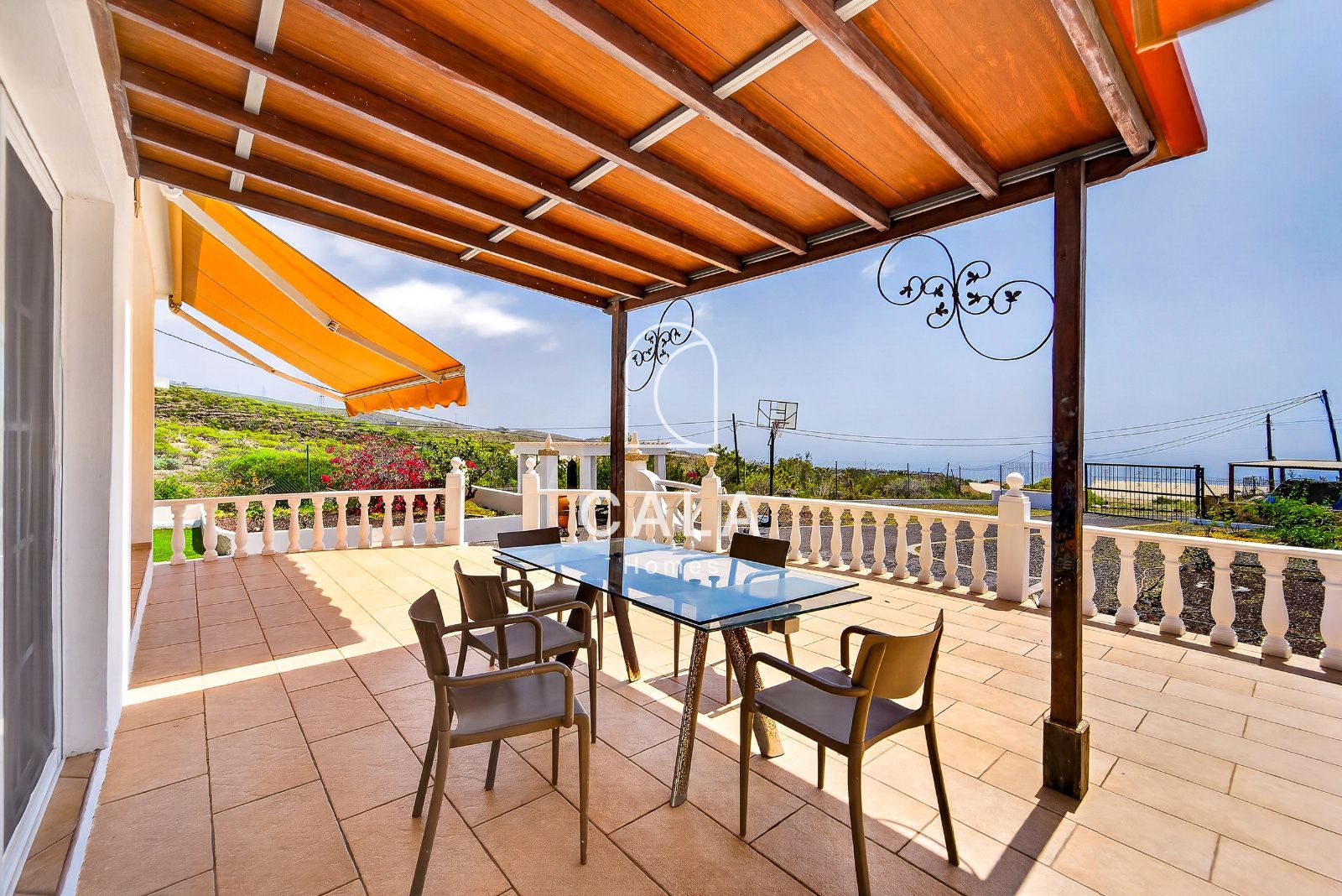 Country house with land and sea views.