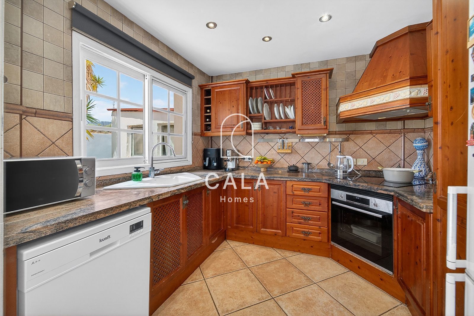 Country house with land and sea views.