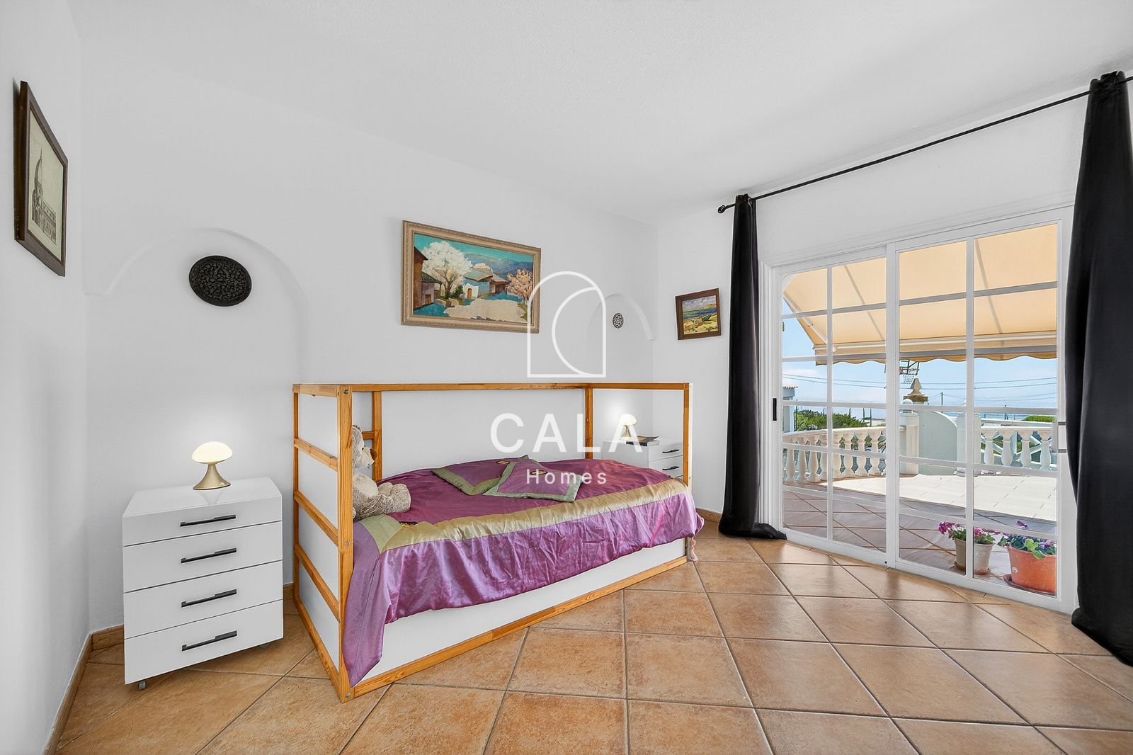 Country house with land and sea views.