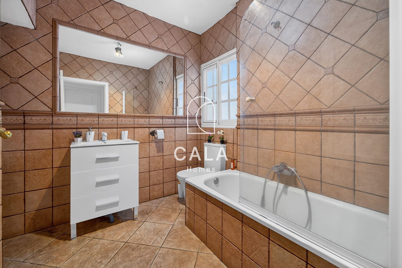 Country house with land and sea views.