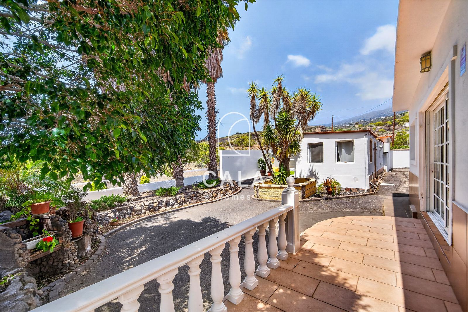 Country house with land and sea views.