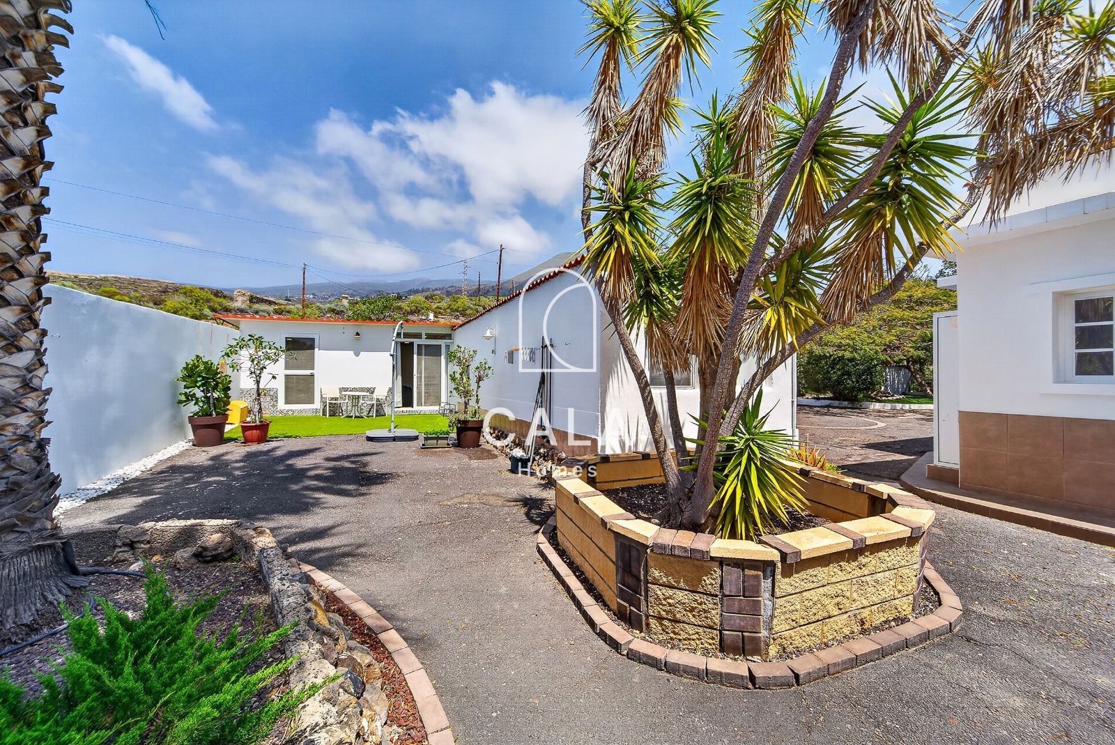 Country house with land and sea views.