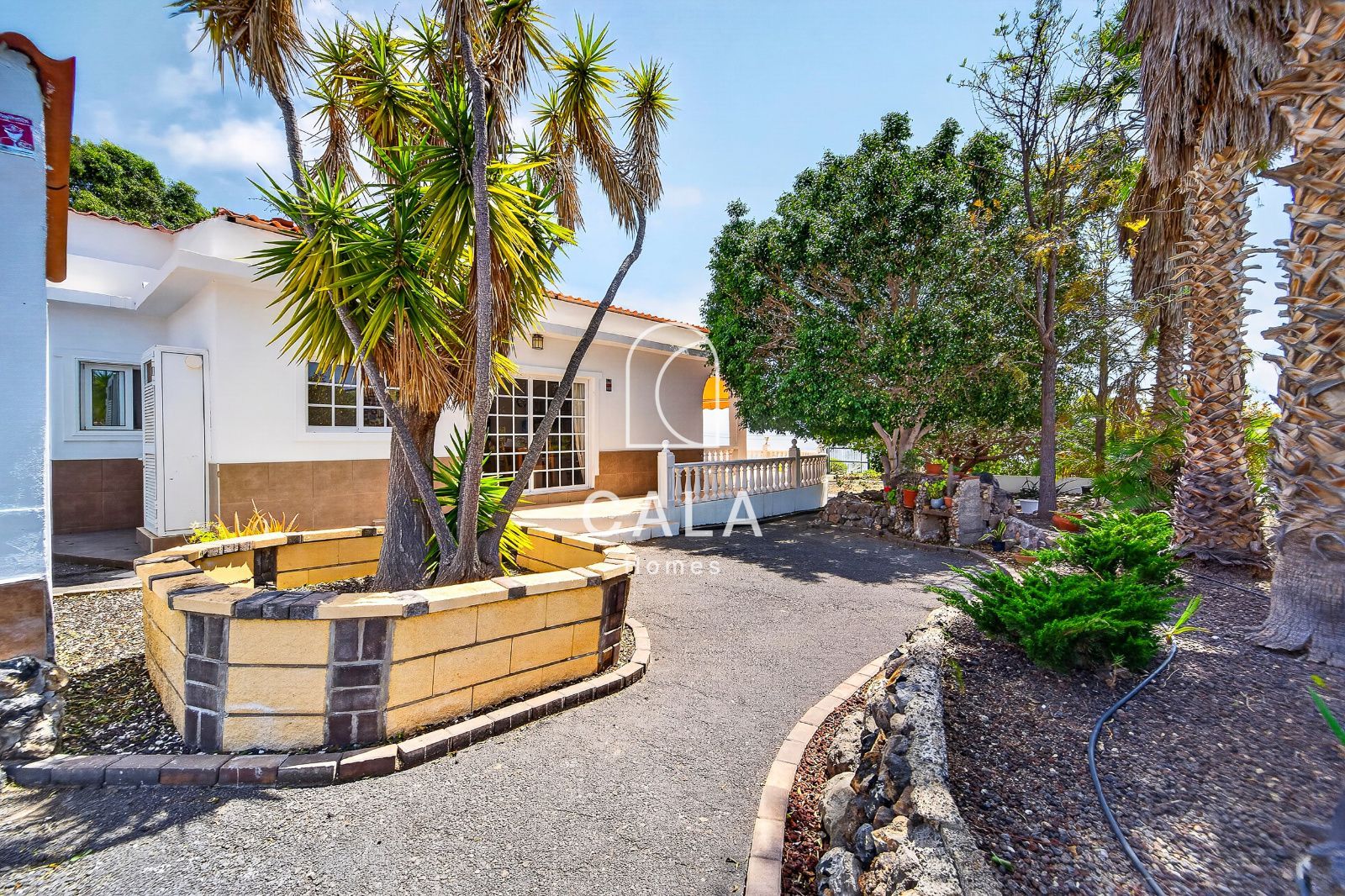 Country house with land and sea views.