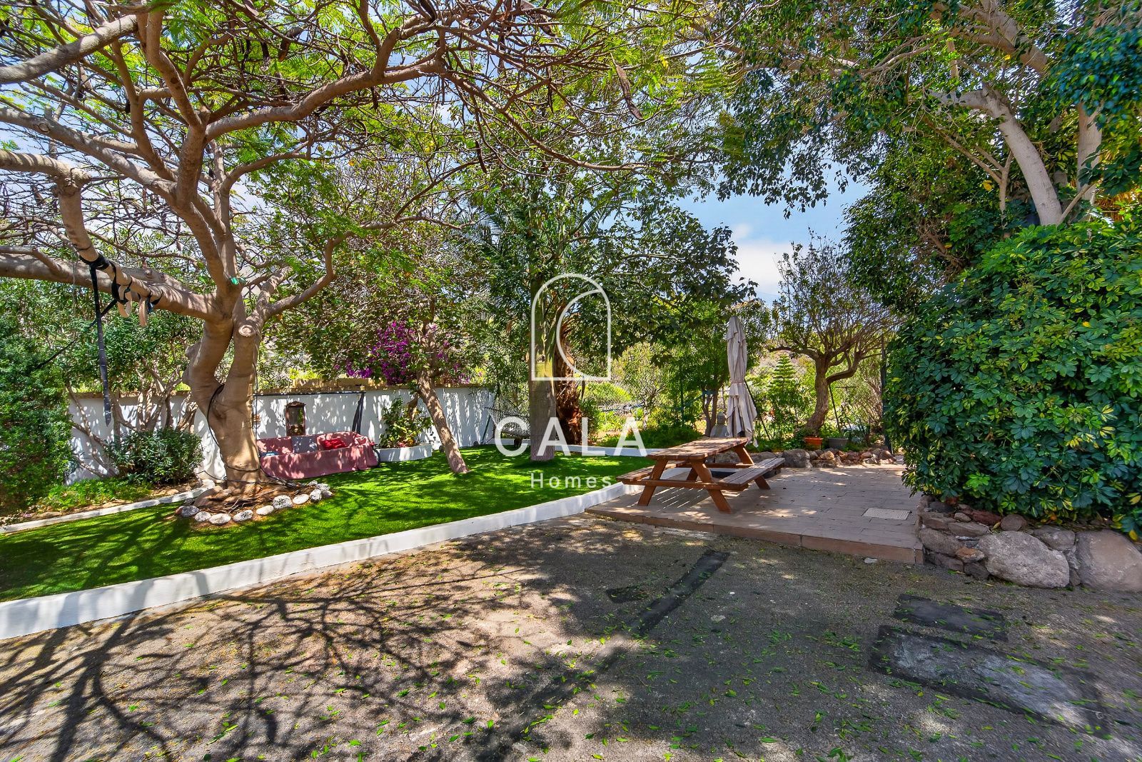 Country house with land and sea views.