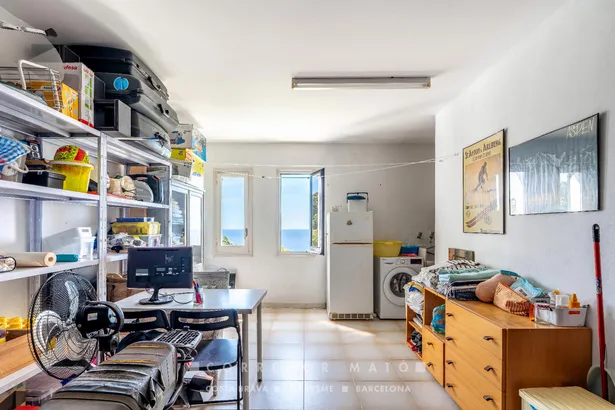 Elegant casa adossada amb vistes al mar, terrassa, jardí i piscina privada a Tamariu.