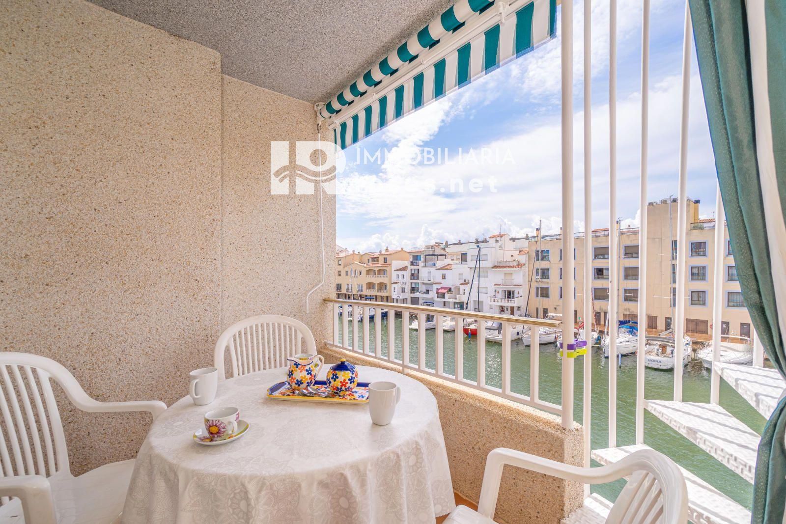 PORT MOXÓ Encantador apartamento de 2 dormitorios con vistas al canal, solárium y parking privado exterior
