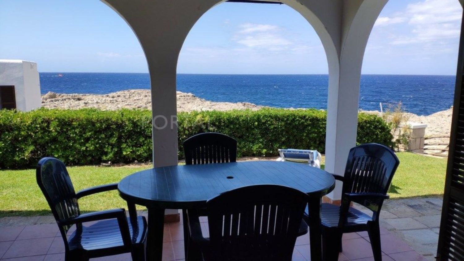 Villa for sale on the seafront in Cala Blanca, in Ciutadella de Menorca