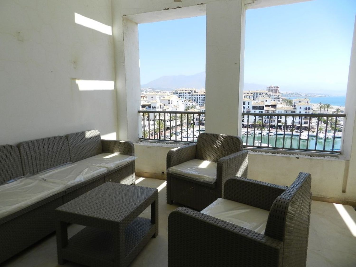 Apartment for sale on the seafront on Calle Delfín, in Manilva
