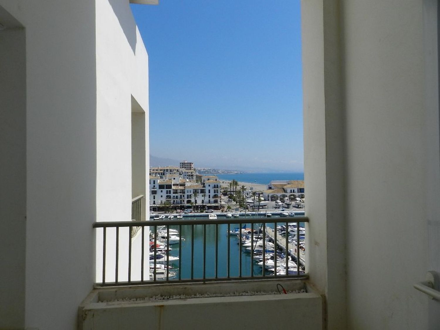 Apartment for sale on the seafront on Calle Delfín, in Manilva