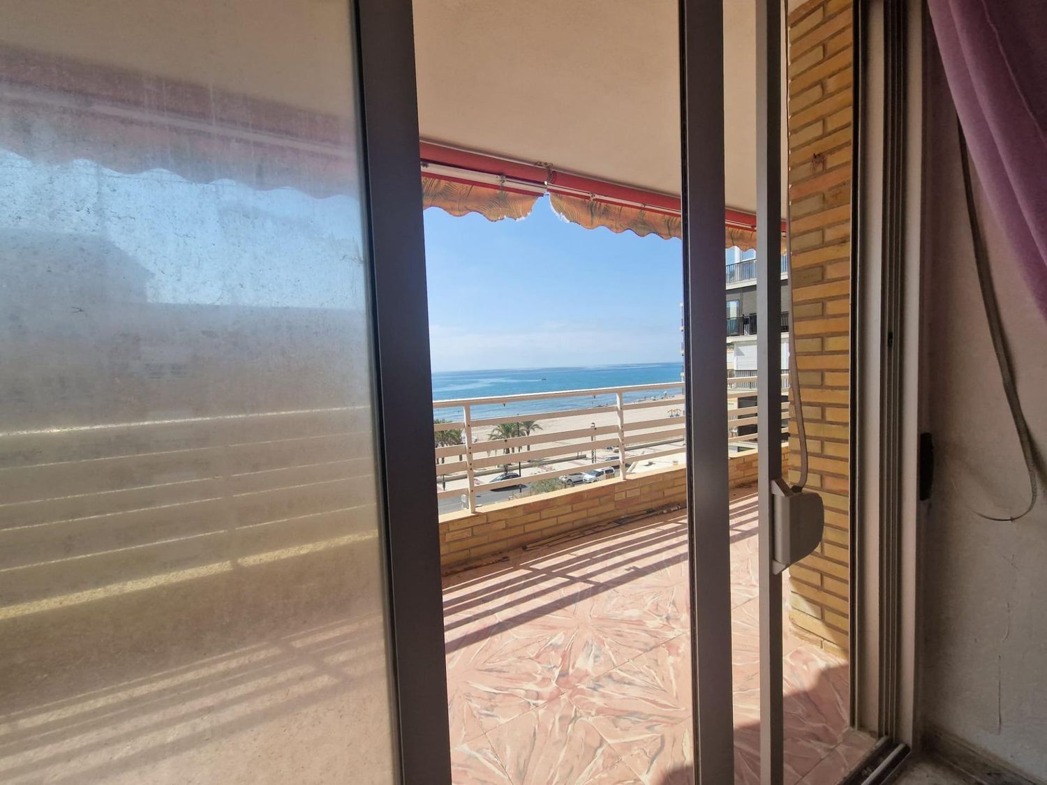 Apartment for sale, in first line of sea in Playa Muchavista, in El Campello.