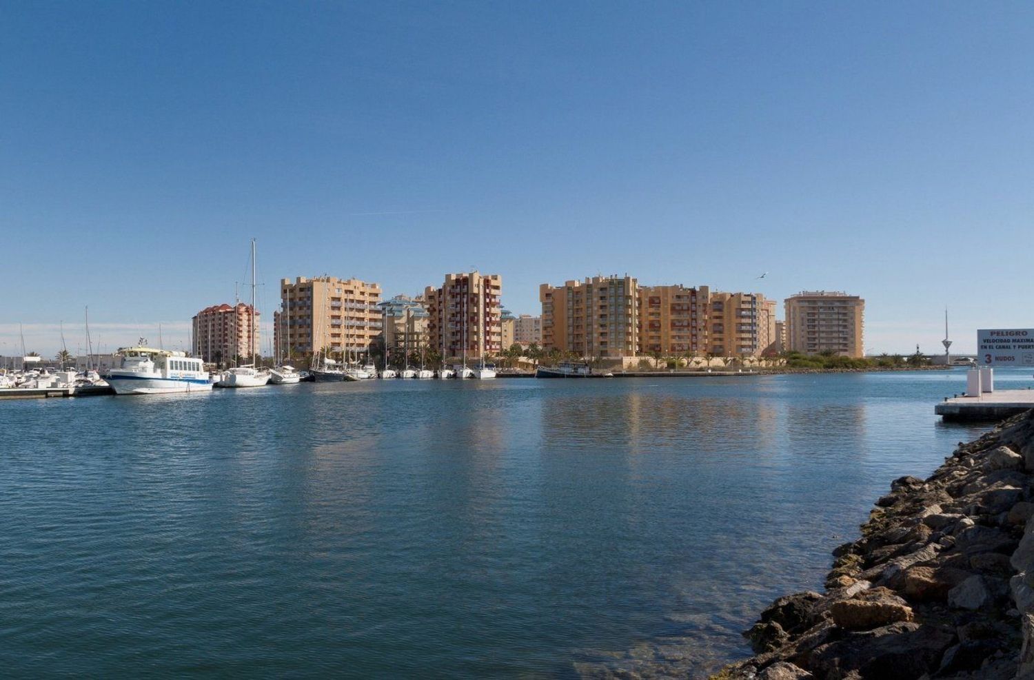 Apartment for sale, in first line of sea in Zona Entremares District, in La Manga del Mar Menor.