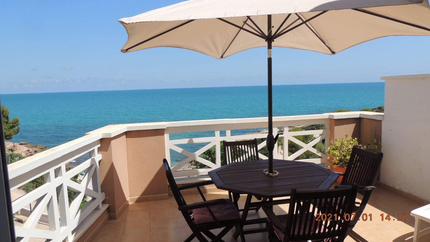 Penthouse for sale, in first line of sea in Cala Puerto Azul, in Peñiscola.