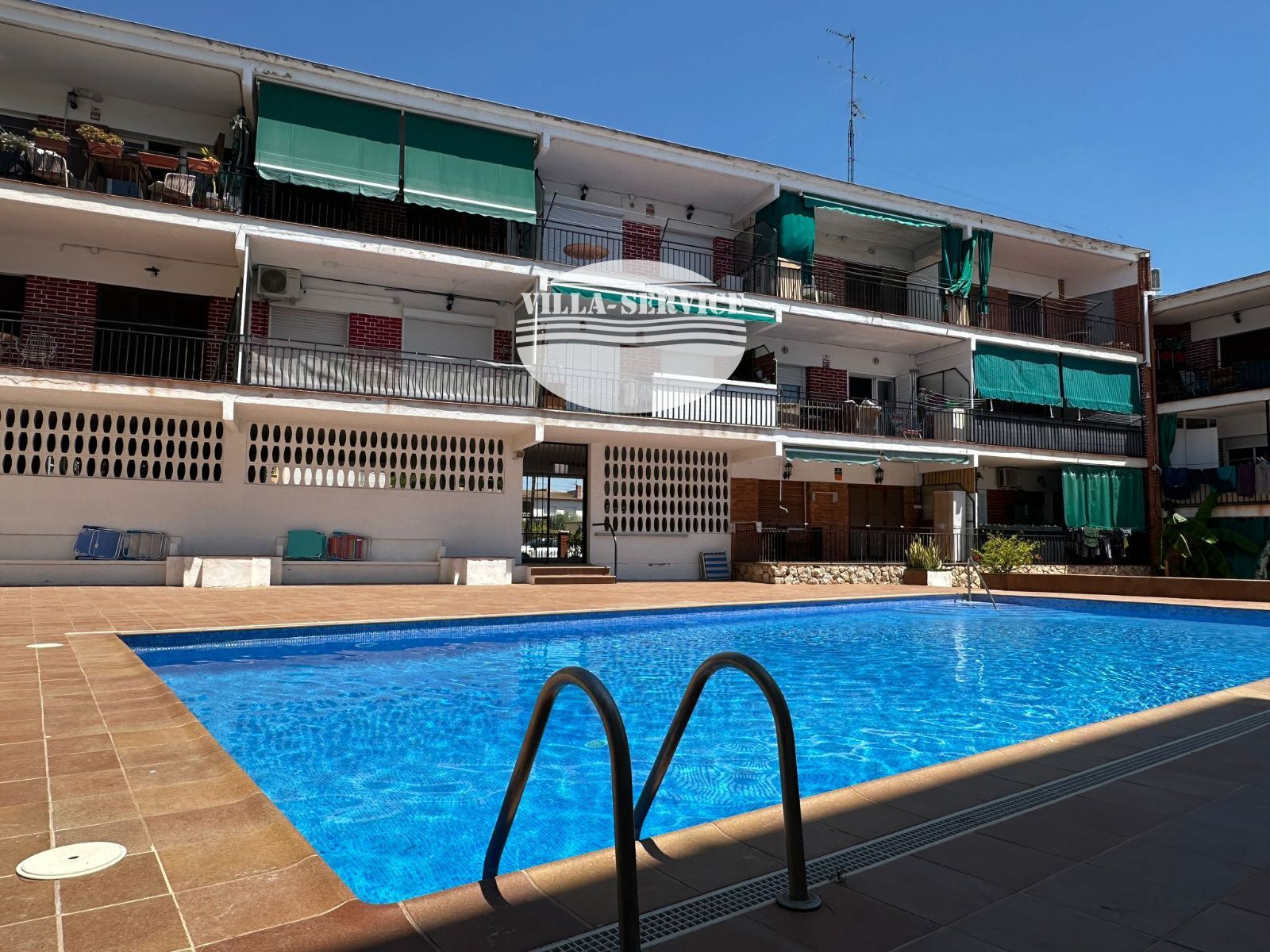 Apartamento con piscina comunitaria